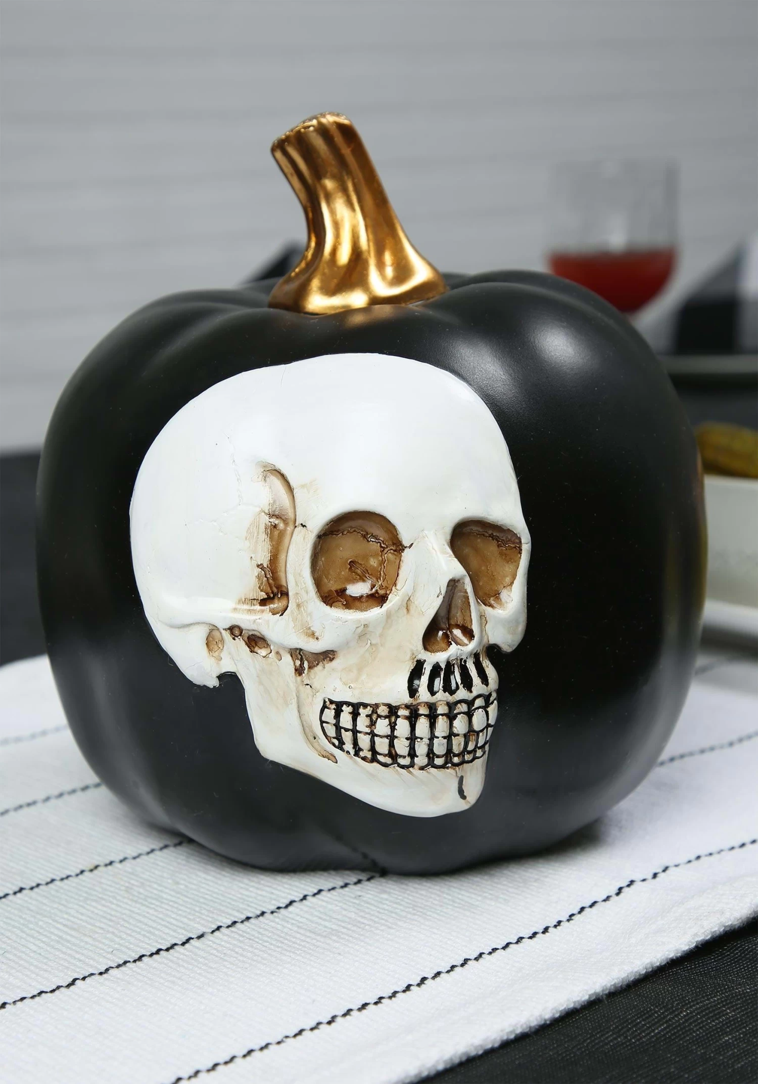 8.5-Inch Black Pumpkin With Embossed Skull Decoration 1 8.5-Inch Black Pumpkin With Embossed Skull Decoration