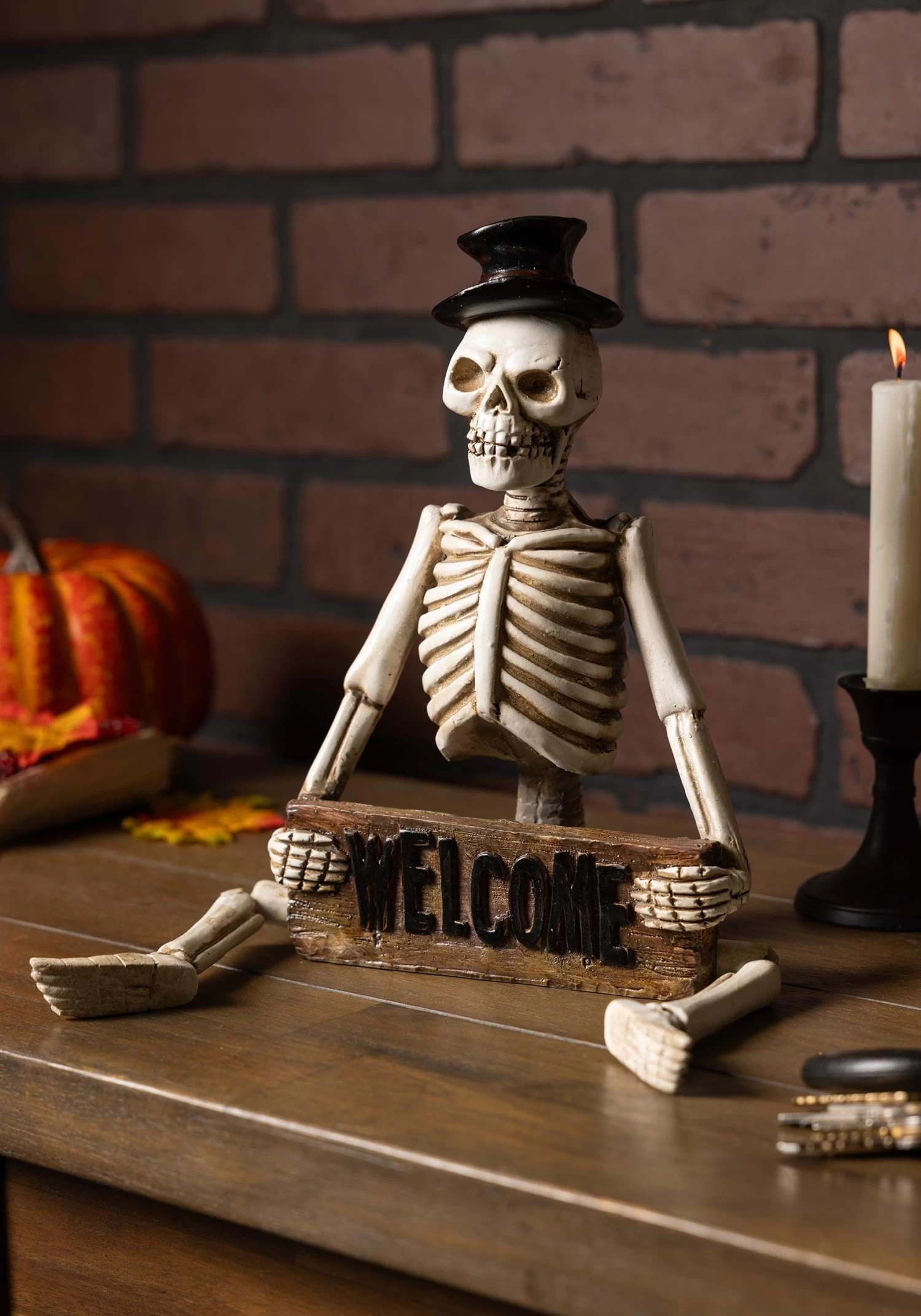17-Inch Resin Skeleton Man Shelf Sitter With Welcome Sign Decoration 1 17-Inch Resin Skeleton Man Shelf Sitter With Welcome Sign Decoration